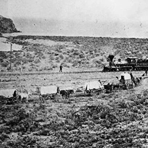 UTAH: RAILROAD, 1869. A train on its way to Promontory Point for the driving of