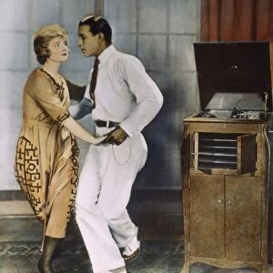 VALENTINO DANCING TANGO. Rudolph Valentino (1895-1926) dancing the tango with Alice Terry