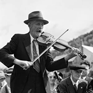 VERMONT: FIDDLER, 1941. Fiddler Ed Lorkin playing music for square dances at the