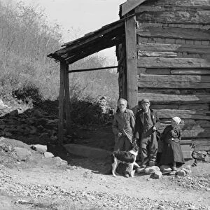 VIRGINIA: FAMILY, 1935. Fennel Corbin and two of his grandchildren outside a home