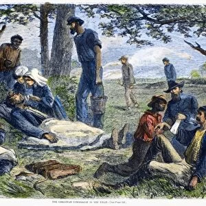 Volunteers of the Christian Commission give first aid to wounded Union soldiers at a battlefield during the American Civil War. Wood engraving, American, 1864