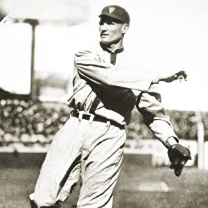 WALTER JOHNSON (1887-1946). American professional baseball player. Pitching in 1925