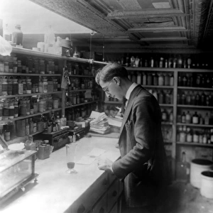 WASHINGTON, D. C. : PHARMACY. A pharmacist at Peoples Drug Store on 8th and H Streets