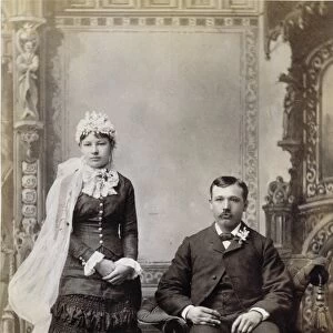 WEDDING COUPLE, c1885. Sitting for the wedding portrait, Indiana