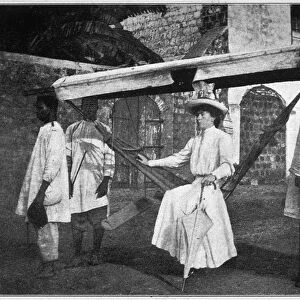WHITES IN AFRICA, 1907. Mrs. Davis in a Borrowed Hammock, the Local Means of