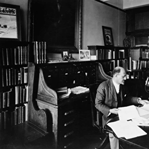 WILLIAM E. B. DU BOIS (1868-1963). American educator, editor and writer. Photographed in his study