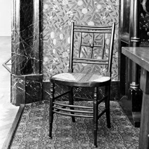 WILLIAM MORRIS DESIGNS. Chair and wallpaper designed by William Morris, 1870s