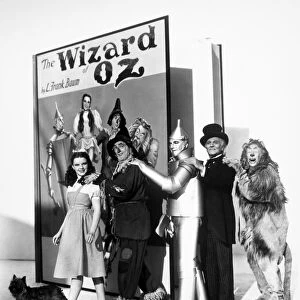 WIZARD OF OZ, 1939. Judy Garland as Dorothy, Ray Bolger as the Scarecrow, Jack Haley as the Tin Woodman, Frank Morgan as the Wizard and Bert Lahr as the Cowardly Lion