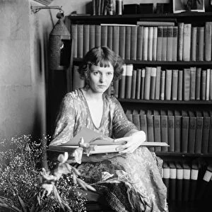 WOMAN, c1920. Portrait of a woman reading. Photograph, c1920