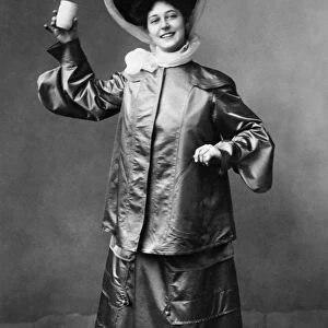 WOMENs FASHION, c1905. A motoring outfit of sized taffeta. Photograph c1905