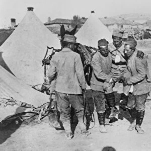 WORLD WAR I: BALKANS. A wounded Serbian soldier being carried into a Red Cross