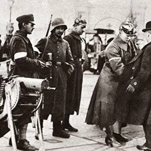 WORLD WAR I: BERLIN, C1919. Soldiers of the Ebert government searching a suspected