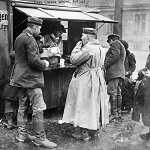 WORLD WAR I: COFFEE WAGON. German troops being served free coffee at a coffee wagon in Lotzen
