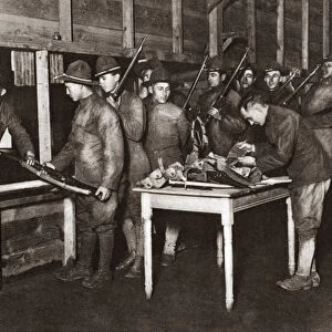 WORLD WAR I: DISCHARGE. Troops turning in their guns after being discharged at Camp Dix