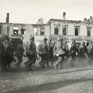 WORLD WAR I: GERMAN TROOPS. German troops marching through a city in Russian Poland