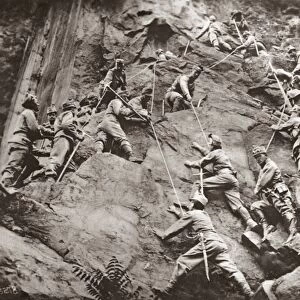 WORLD WAR I: ITALIAN ALPS. Austrian troops climbing over a mountain pass in the