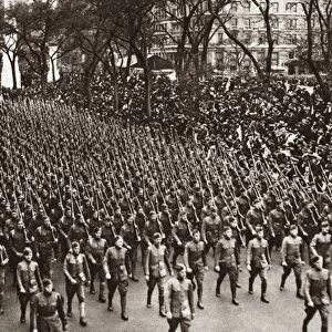 WORLD WAR I: PARADE, 1919. The 308th Infantry passing the Arch of the Jewels in
