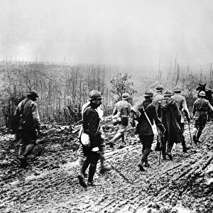 WORLD WAR I: TROOPS, c1916. French troops walking along a road during World War I