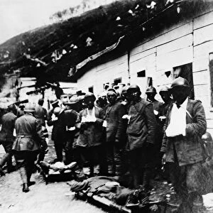 WORLD WAR I: WOUNDED, c1916. Wounded Italian soldiers outside a dressing station