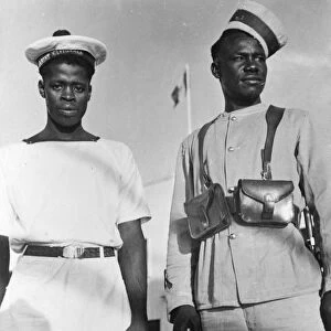 WORLD WAR II: LIBYA. Members of the Free French Naval Force (left) and the Free French Army