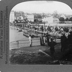 WWI: FRANCE, c1916. French troops crossing the Marne by pontoon bridge. Stereograph