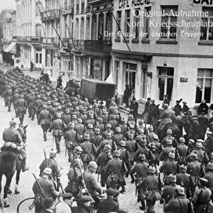 WWI: GERMAN SOLDIERS, c1914. German soldiers marching through the streets of Ostend, Belgium