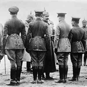 WWI: IRON CROSS, c1914. Kaiser Wilhelm II awarding the Iron Cross to German aviators