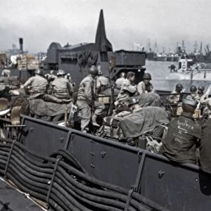 WWII: D-DAY, 1944. American troops on board a landing ship in a British port, shortly