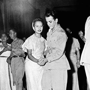 WWII: DANCE, c1943. Unidentified American servicemen at a dance. Photograph, c1943