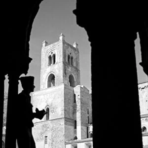 WWII: SICILY, 1943. An American soldier taking a photograph near the cathedral in Monreale