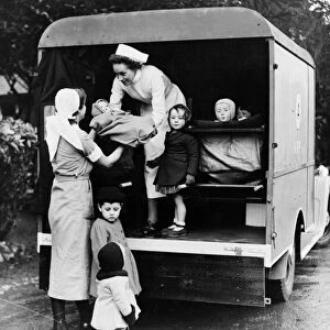WWII: WAR NURSERY. Children of war-working mothers arrive via A