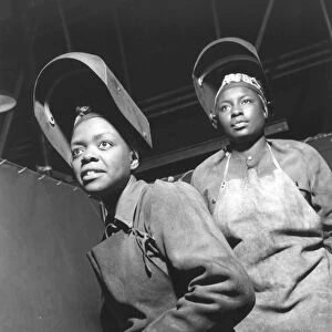 WWII: WOMEN WELDERS at the Landers, Frary and Clark Plant, New Britain, Connecticut