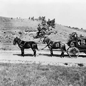 YELLOWSTONE: STAGECOACH, c1913. An old horse drawn stagecoach in Yellowstone National Park