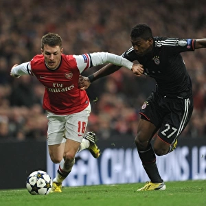 Arsenal's Aaron Ramsey Faces Off Against Bayern Munchen's David Alaba in Champions League Showdown