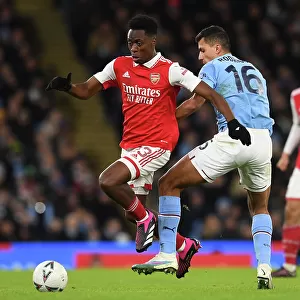 Arsenal's Albert Sambi Lokonga Clashes with Manchester City's Rodrigo in Emirates FA Cup Showdown