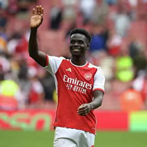 Arsenal's Bukayo Saka Celebrates Victory Over Nottingham Forest in 2023-24 Premier League