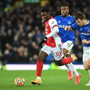 Arsenal's Eddie Nketiah Outmaneuvers Everton's Seamus Coleman in Premier League Clash