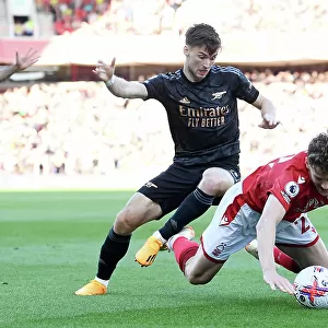 Arsenal's Kieran Tierney Fights for Possession Against Nottingham Forest in Premier League Clash