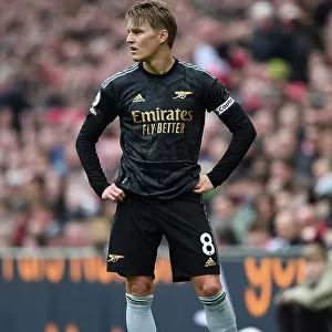 Arsenal's Martin Odegaard Goes Head-to-Head with Liverpool in Premier League Battle (2022-23)