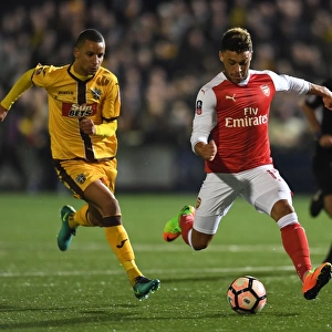 Arsenal's Oxlade-Chamberlain Faces Off Against Sutton's Eastmond: The FA Cup Shock Encounter