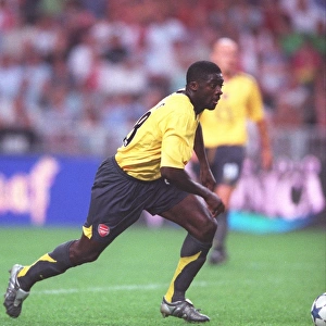 Arsenal's Triumph: Kolo Toure Leads the Way in Arsenal's 1-0 Victory over Ajax at the Amsterdam Tournament, 2005