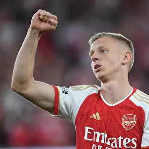 Arsenal's Victory Over Manchester City: Zinchenko Celebrates with Arsenal Fans (2023-24)