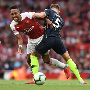 Clash of Titans: Aubameyang vs. Stones - Arsenal vs. Manchester City, Premier League 2018-19: A Duel between Aubameyang and Stones at Emirates Stadium
