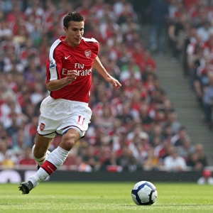 Robin van Persie's Brilliant Performance: Arsenal's 4-0 Victory Over Wigan Athletic in the Premier League