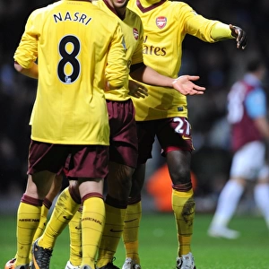 Theo Walcott celebrates scoring the 2nd Arsenal goal with Samir Nasri and Emmauel Eboue
