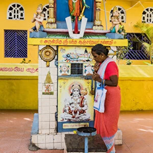 A pilgrim at a Hindu shrine at Mamallapuram in Tamil Nadu, India