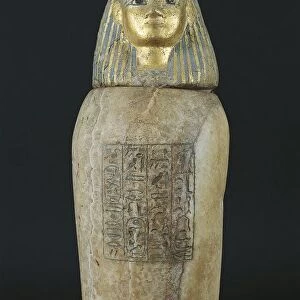 Alabaster and gold leaf canopic jar with human head, symbol of genius Imset, protector of liver, son of Horus from Tanis, tomb of Psusennes I, crypt