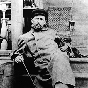 Anton chekhov, russian author, with his dachshund quinine, may 1897, at melikhovo, the chekhov estate