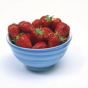Blue bowl filled with strawberries