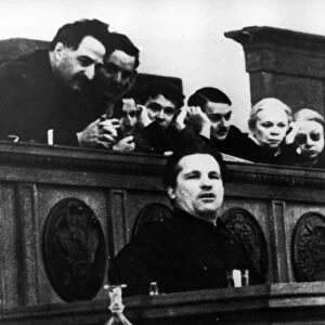 Bolshevik leader sergei mironovich kirov speaking at the 17th congress of the all-union communist party of bolsheviks in february 1934, ordzhonikidze is behind him on the left